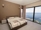 Прелепа модерна вила са 3 спаваће собе у доброј води са панорамским погледом на море и базеном