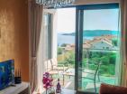 Zapanjujući apartman s pogledom na more i planine površine 51 m2 u Bečićima, 500 m od plaže