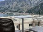 Luksuzni apartman s pogledom na more površine 136 m2 u Kotoru, Crna Gora