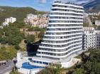 Zapanjujući apartman s pogledom na more površine 51 m2 u Bečićima u rezidenciji s bazenom