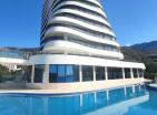Pamje mahnitëse nga deti apartament 51 m2 në Becici në rezidencë me pishinë