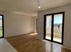 Novi dvosobni stan 46 m2 u Tivtu u blizini Porto Montenegro s terasom