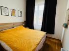 Ekskluzivni apartman s 2 spavaće sobe površine 48 m2 samo 150 metara od mora u Tivtu