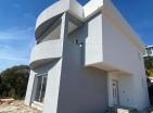 Nueva casa de 140 m2 con vistas al mar en Dobra Voda en una ubicación privilegiada